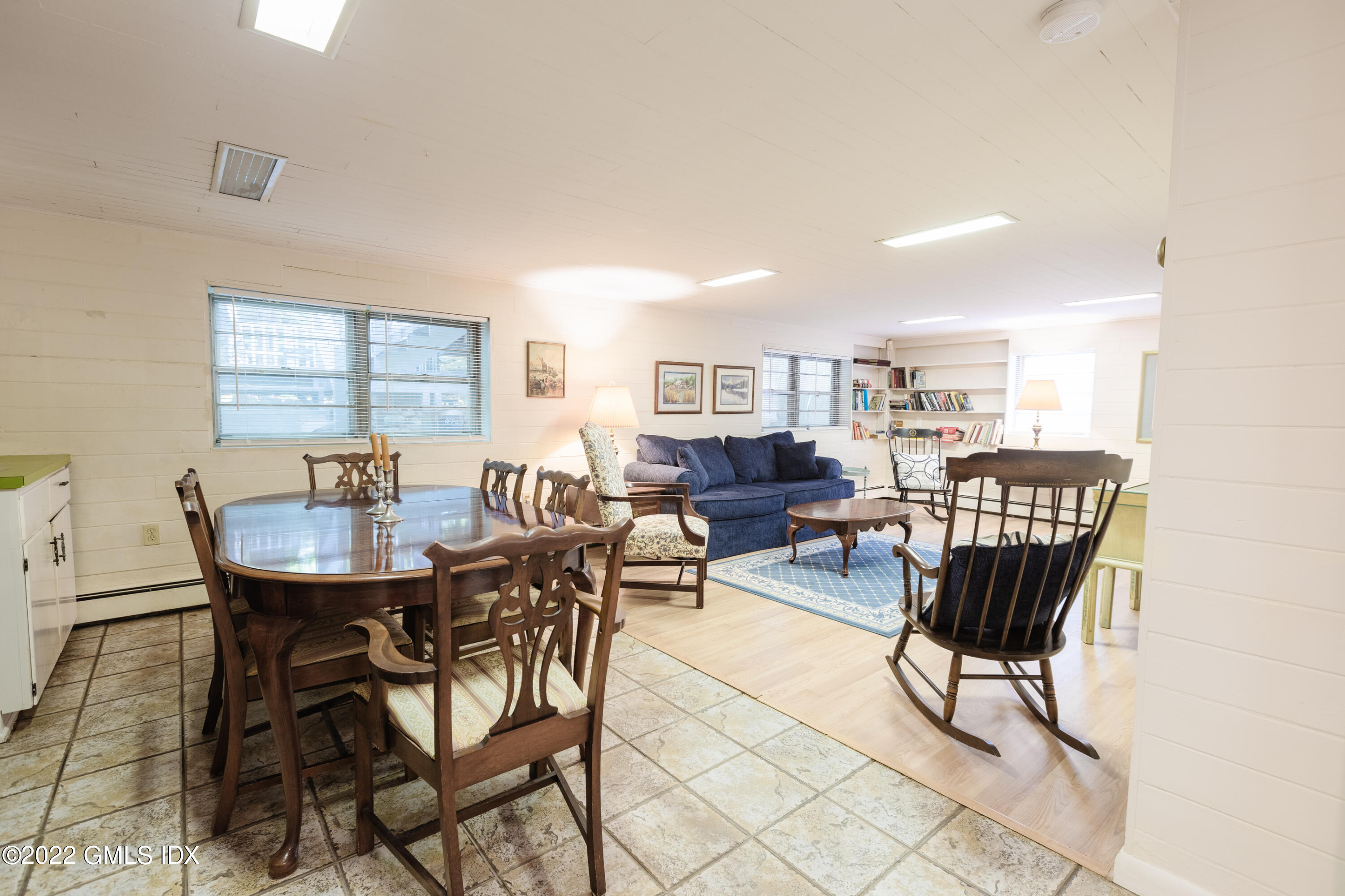 65 Laddins Rock Road Old Greenwich, CT 06870 - Photo 29 of 40 a view of a dining room with furniture and a window