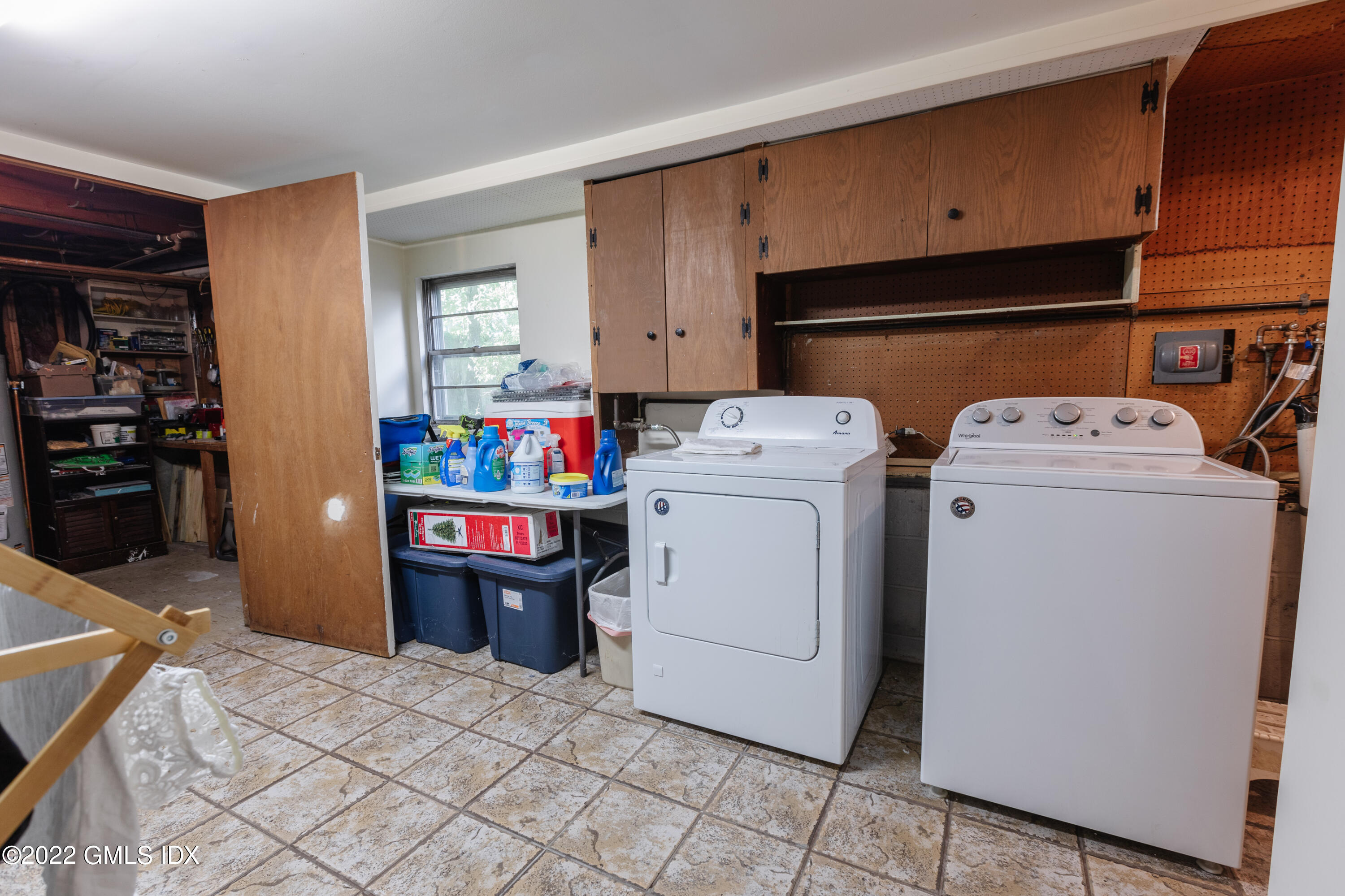 65 Laddins Rock Road Old Greenwich, CT 06870 - Photo 33 of 40 a utility room with dryer and washer
