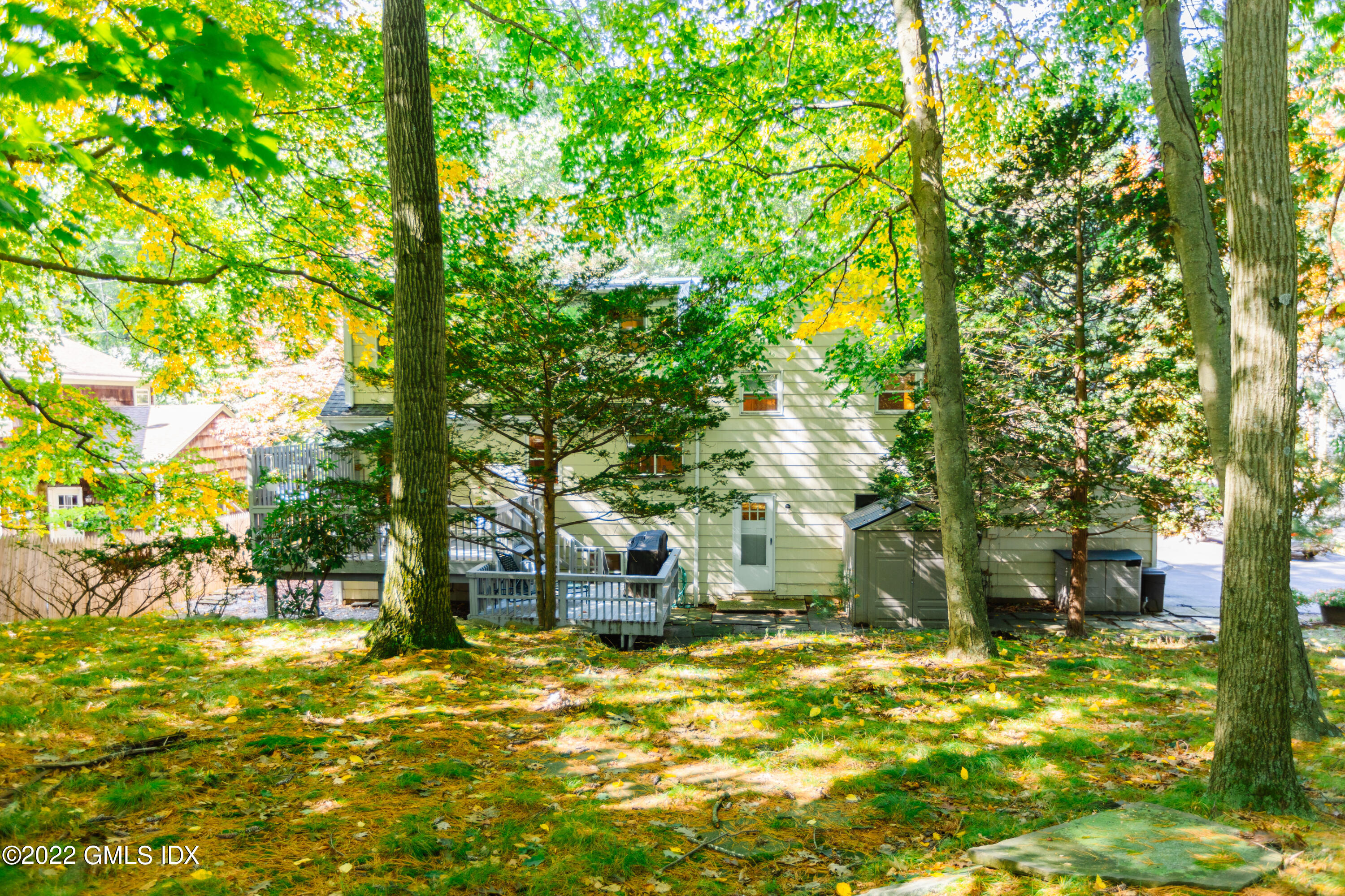 65 Laddins Rock Road Old Greenwich, CT 06870 - Photo 37 of 40 a view of a swimming pool with a trees