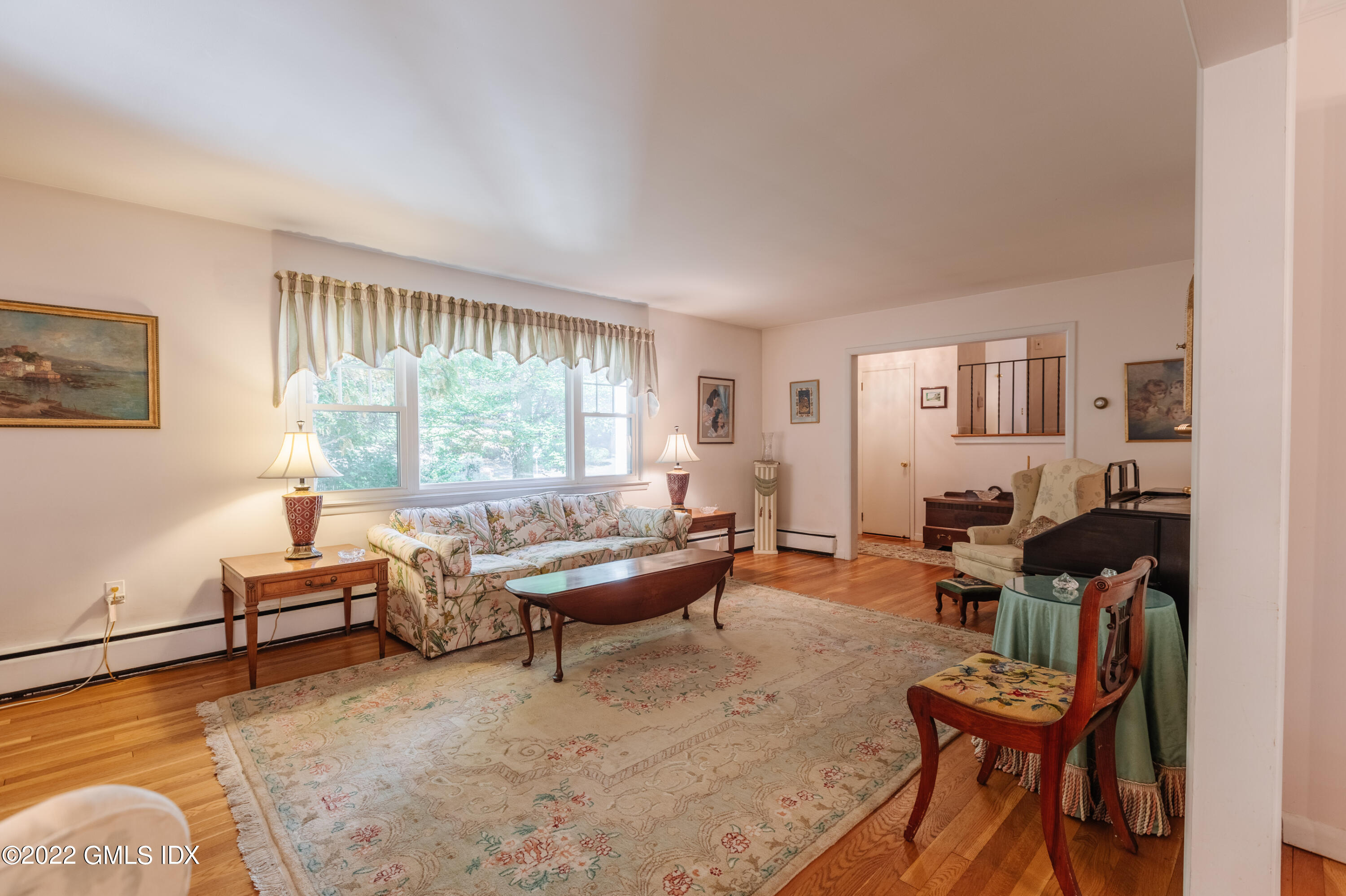 65 Laddins Rock Road Old Greenwich, CT 06870 - Photo 6 of 40 a living room with furniture and a window