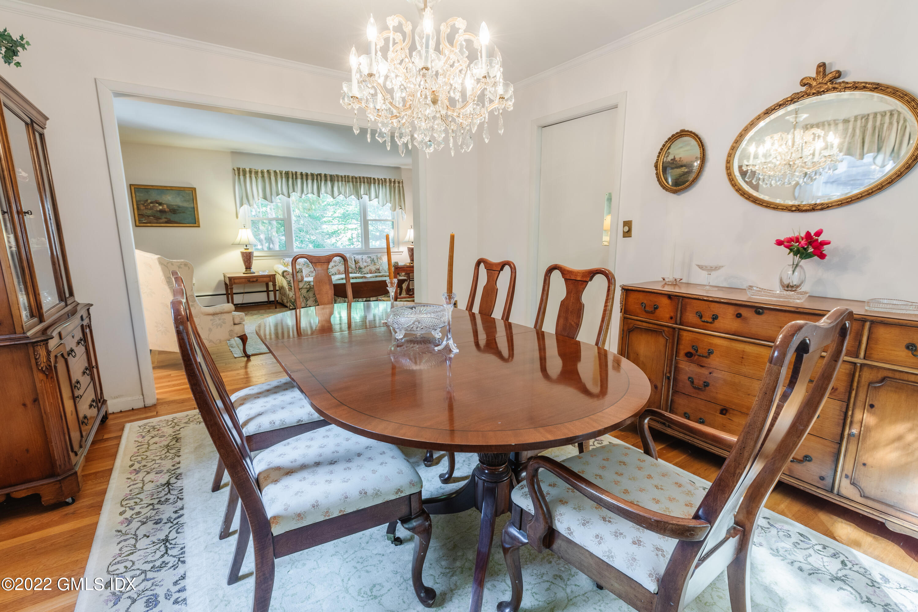 65 Laddins Rock Road Old Greenwich, CT 06870 - Photo 9 of 40 a view of a dining room with furniture window and wooden floor