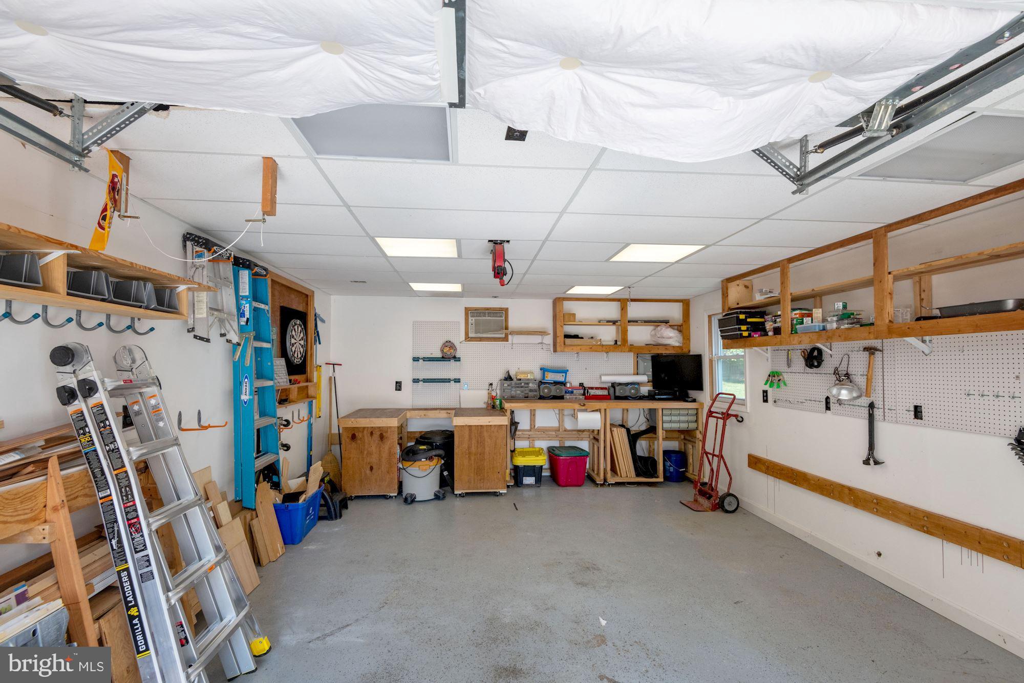 17617 Buehler Road Olney, MD 20832 - Photo 30 of 42 Garage with workshop space, AC and electric