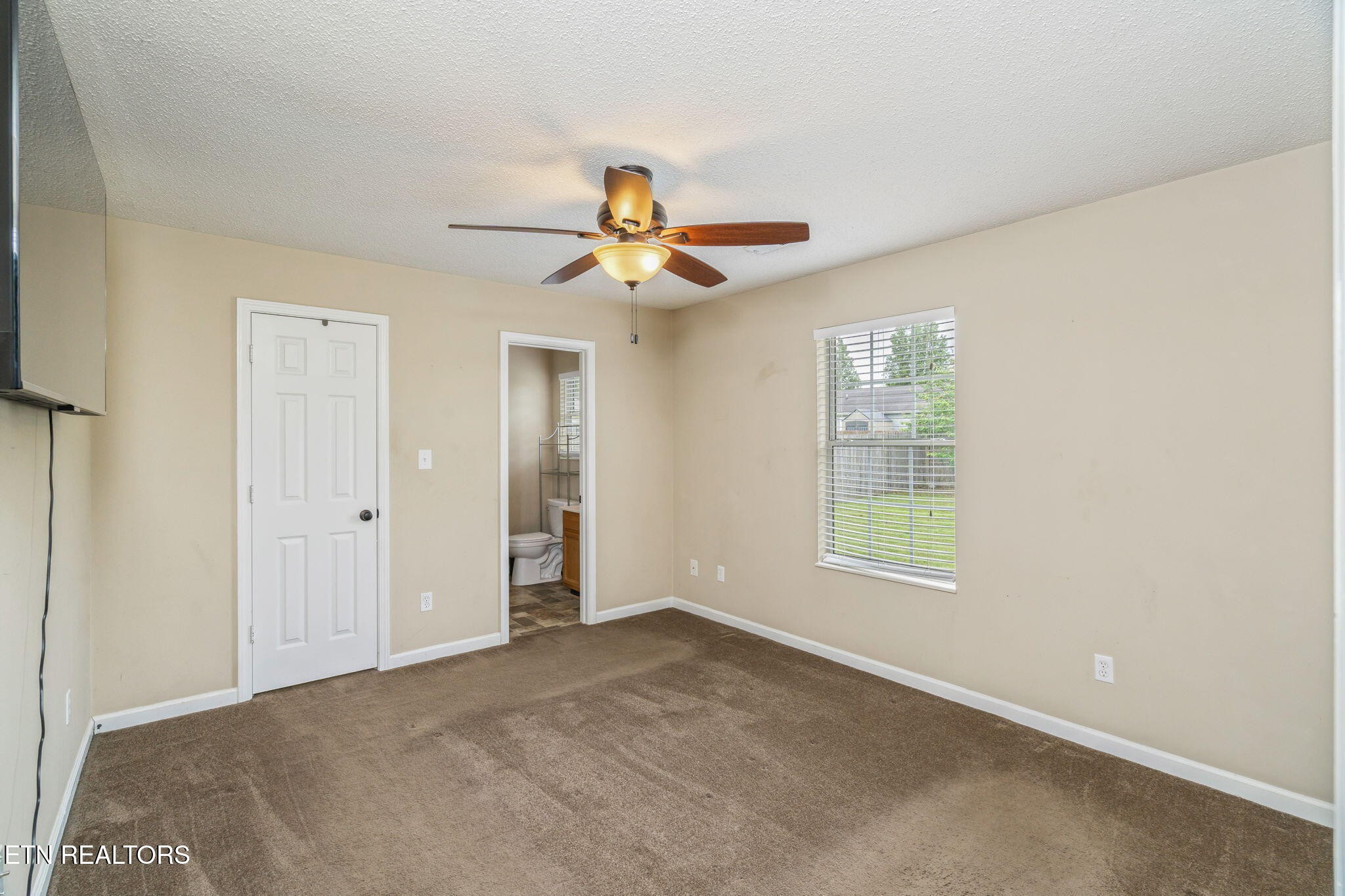 7536 Gary White Road Corryton, TN 37721 - Photo 13 of 26 a view of an empty room with a window