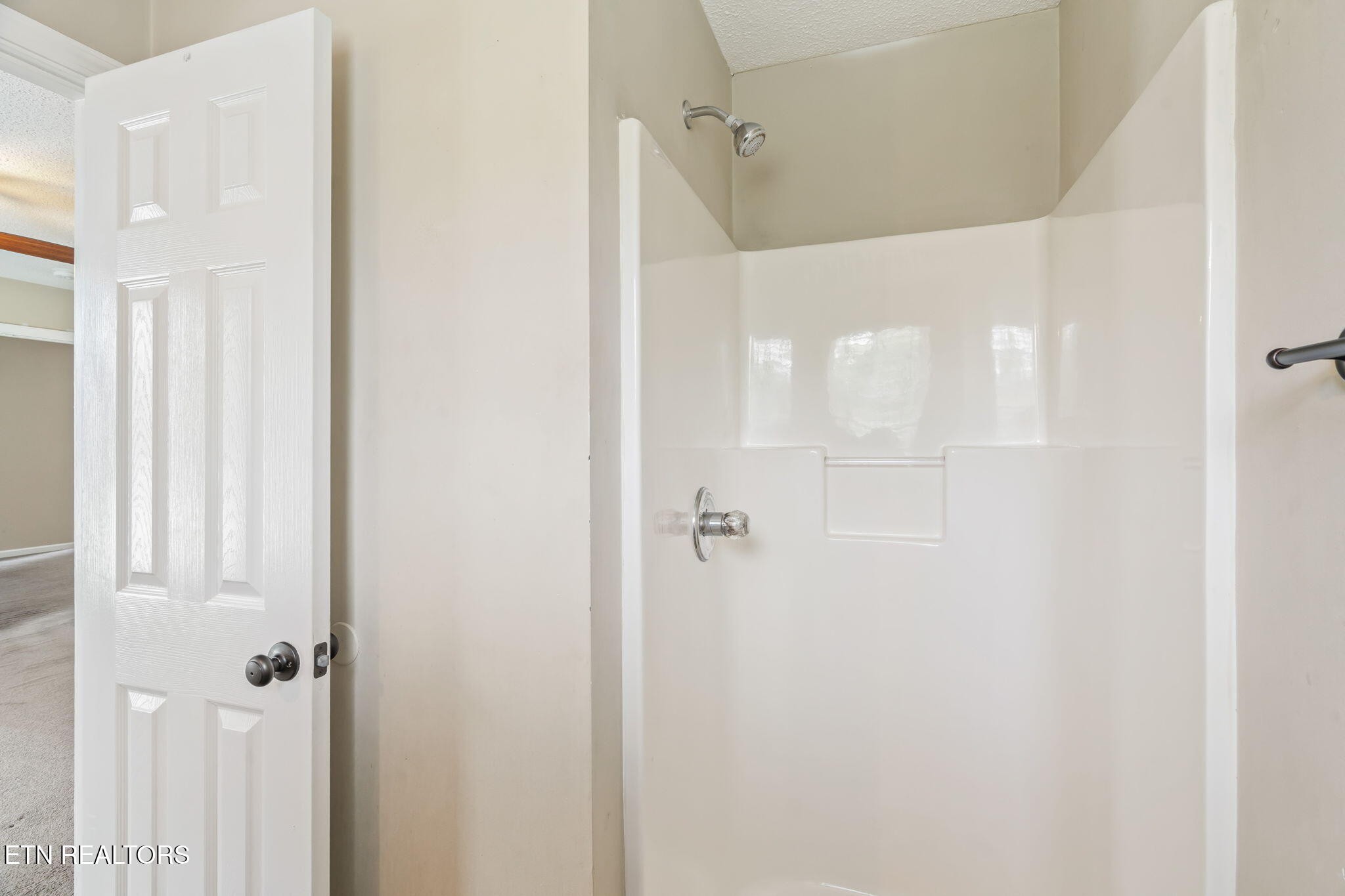 7536 Gary White Road Corryton, TN 37721 - Photo 16 of 26 a bathroom with a shower