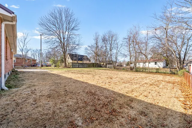 a view of road with trees