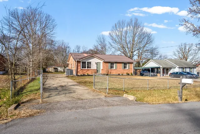 a front view of a house with swimming pool