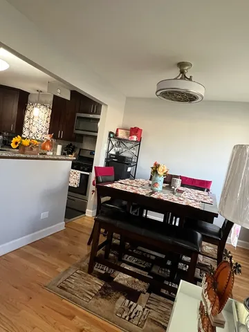 a view of a workspace with furniture