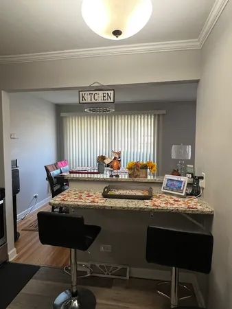 a kitchen with a stove and a refrigerator