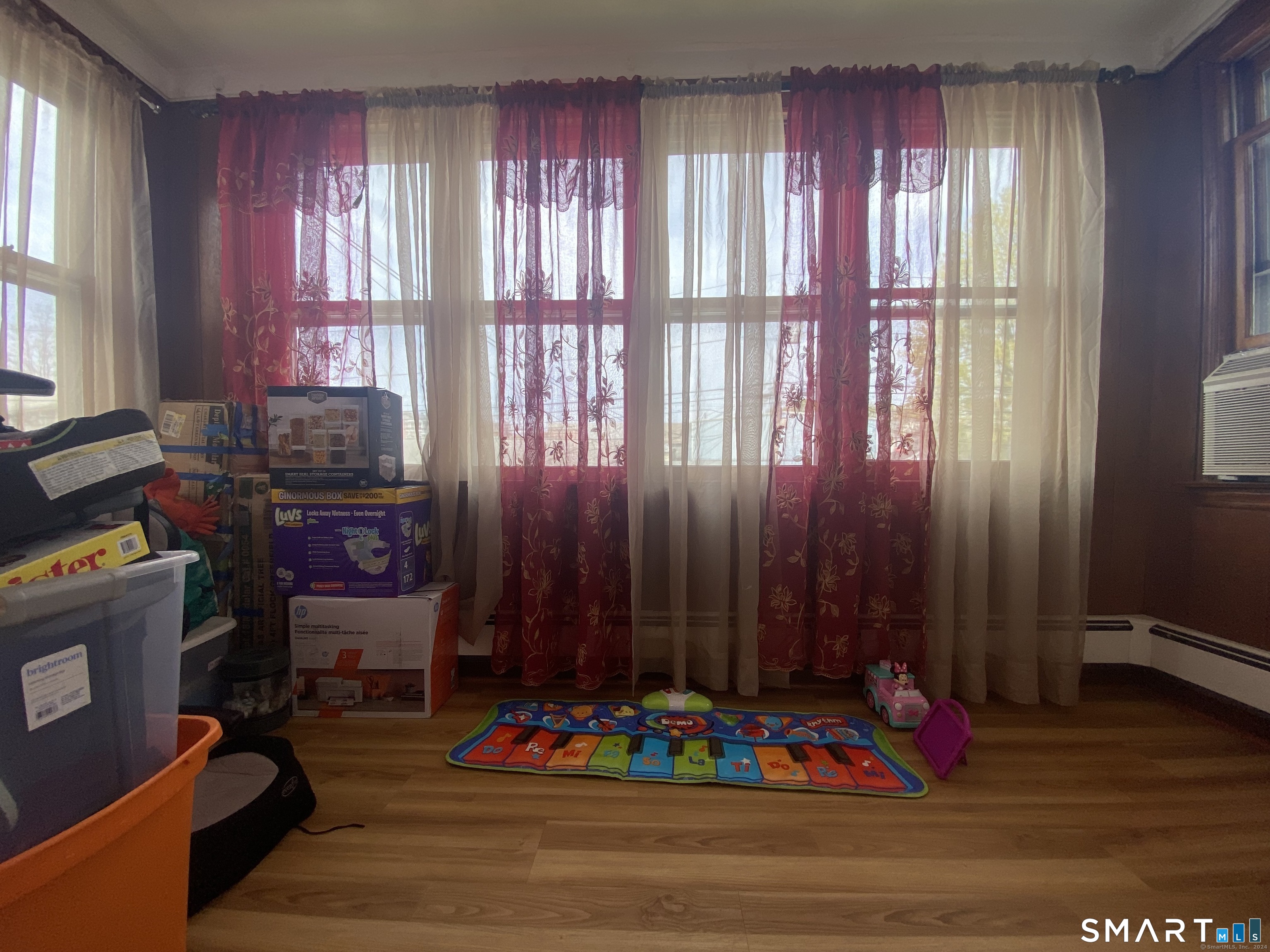 39 Pierce Street Fairfield, CT 06825 - Photo 11 of 18 a living room with furniture and window