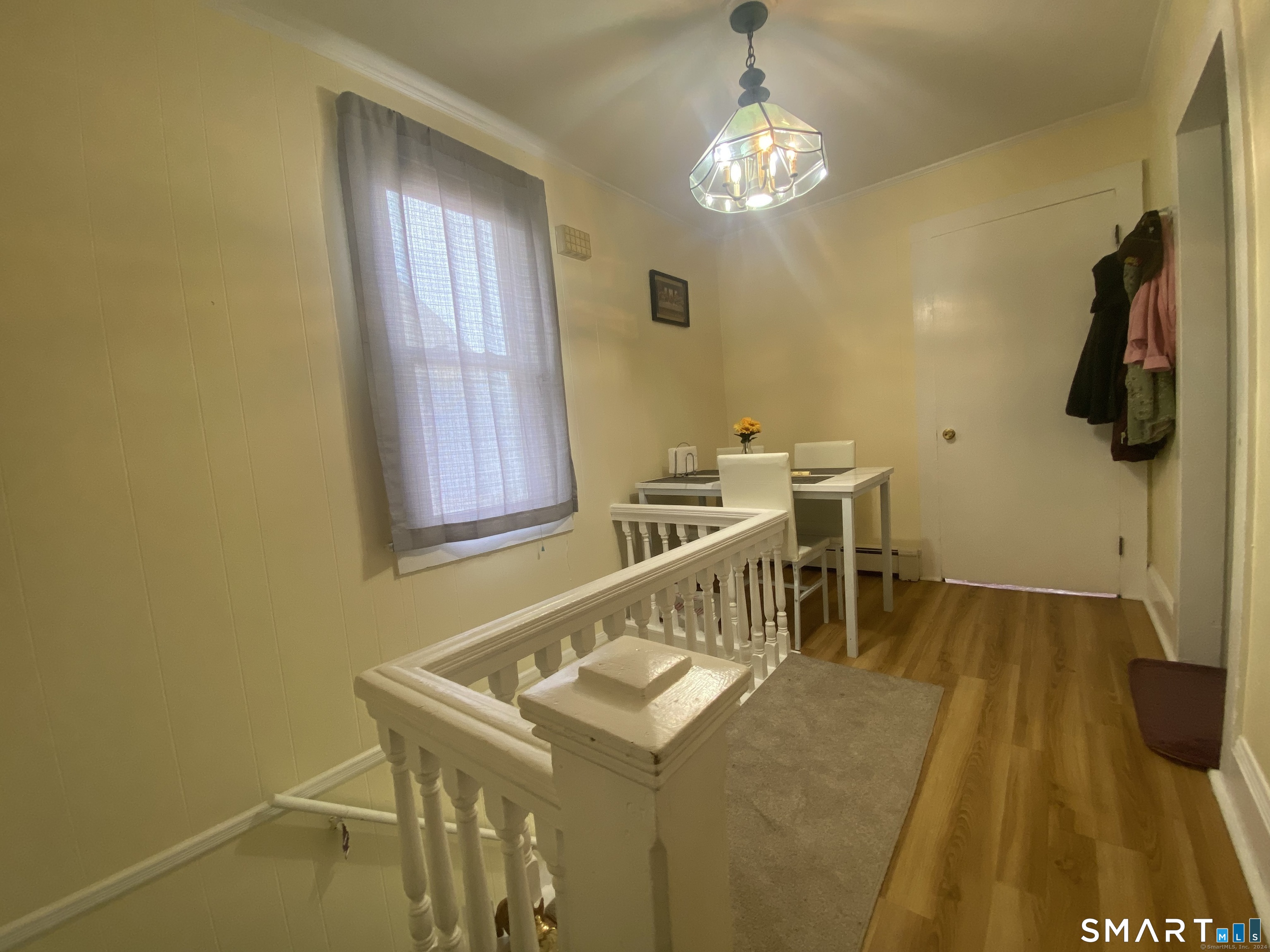 39 Pierce Street Fairfield, CT 06825 - Photo 3 of 18 a view of a room with furniture and chandelier