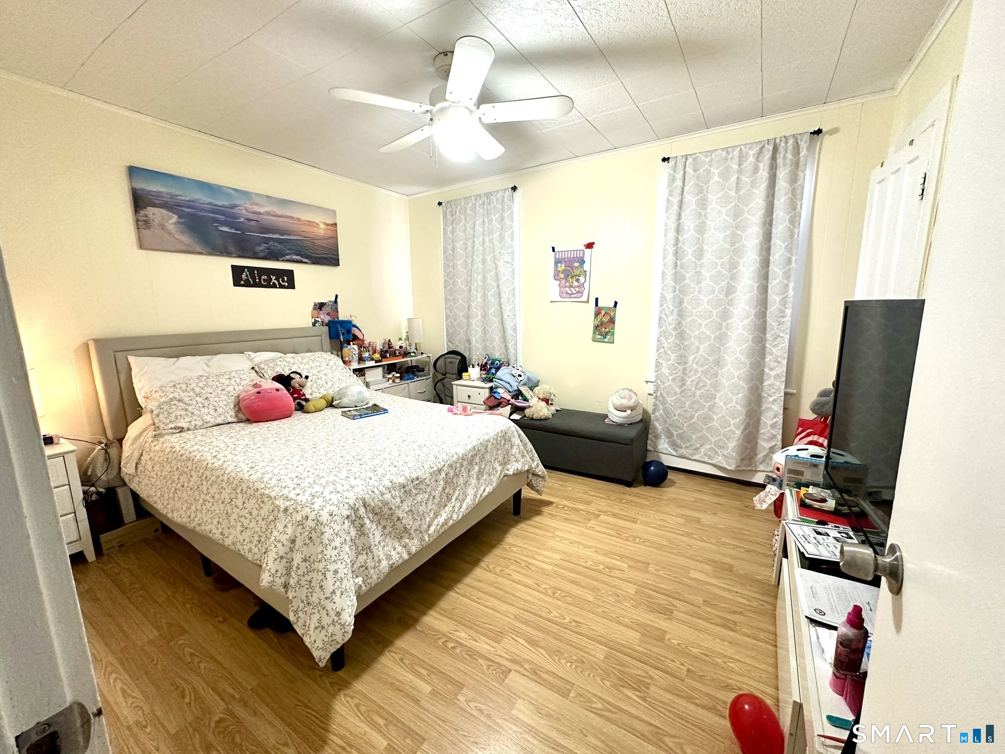 39 Pierce Street Fairfield, CT 06825 - Photo 10 of 18 a bedroom with bed and a window