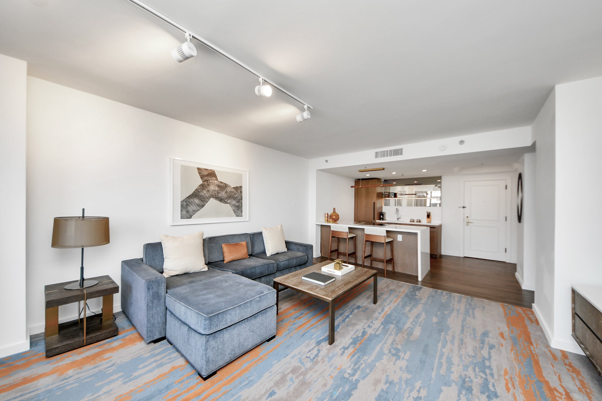 1300 Lamar Street, Unit T8 Houston, TX 77010 - Photo 13 of 48 a living room with furniture and a wooden floor
