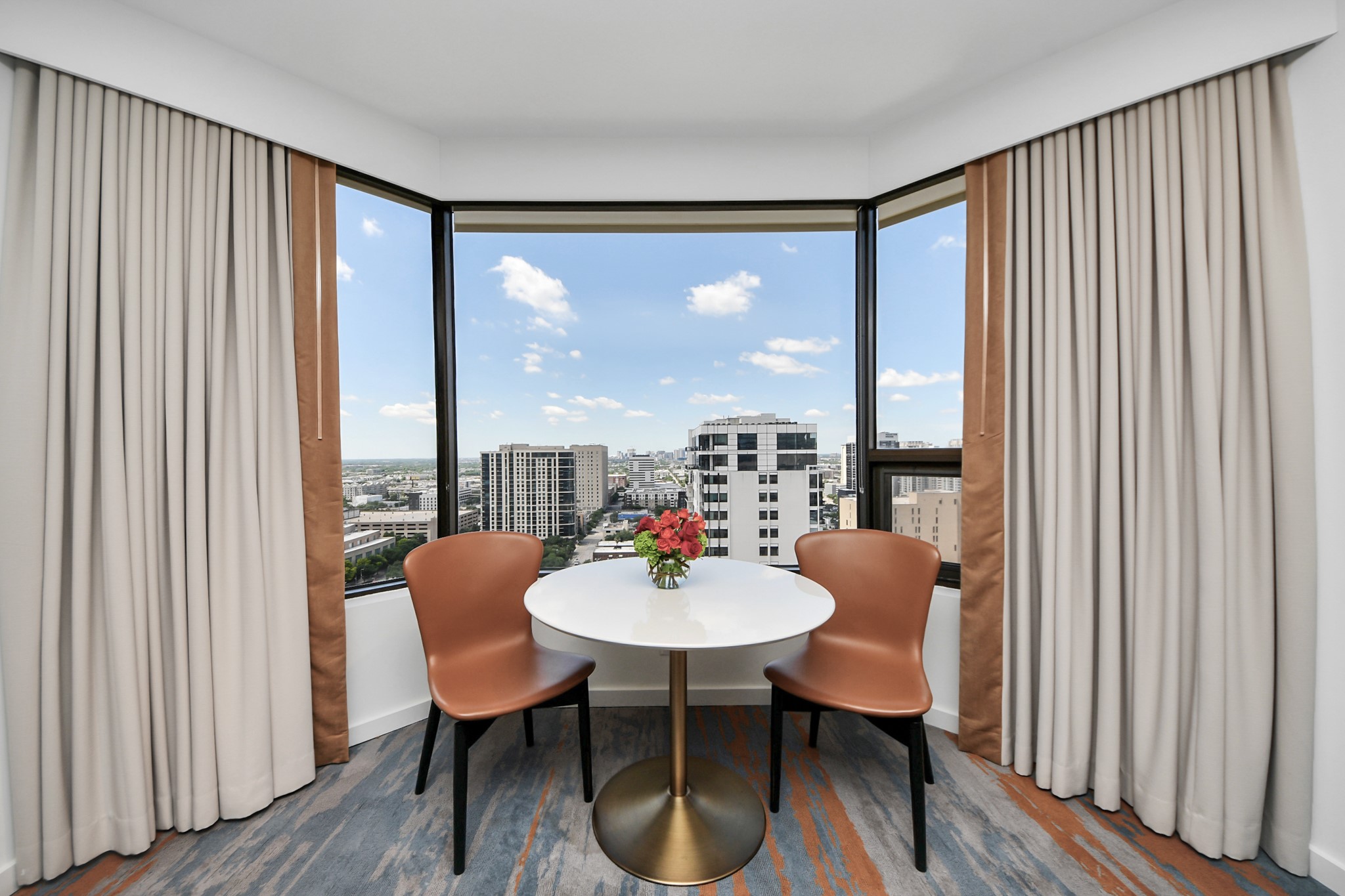 1300 Lamar Street, Unit T8 Houston, TX 77010 - Photo 15 of 48 a dining room with furniture and a window