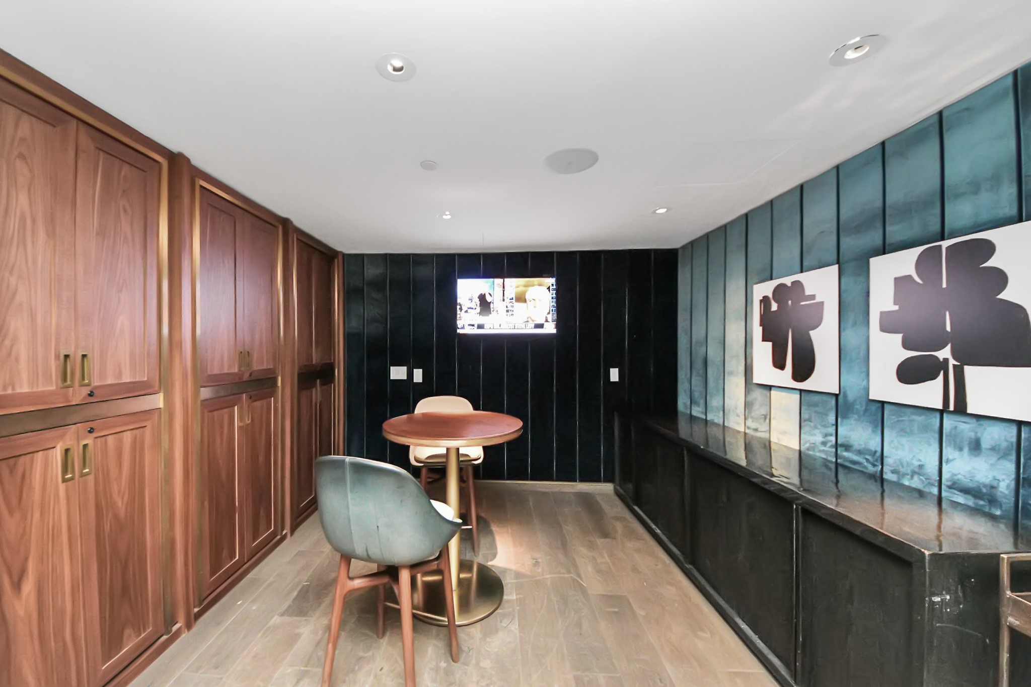 1300 Lamar Street, Unit T8 Houston, TX 77010 - Photo 36 of 48 a room with stainless steel appliances furniture and wooden floor