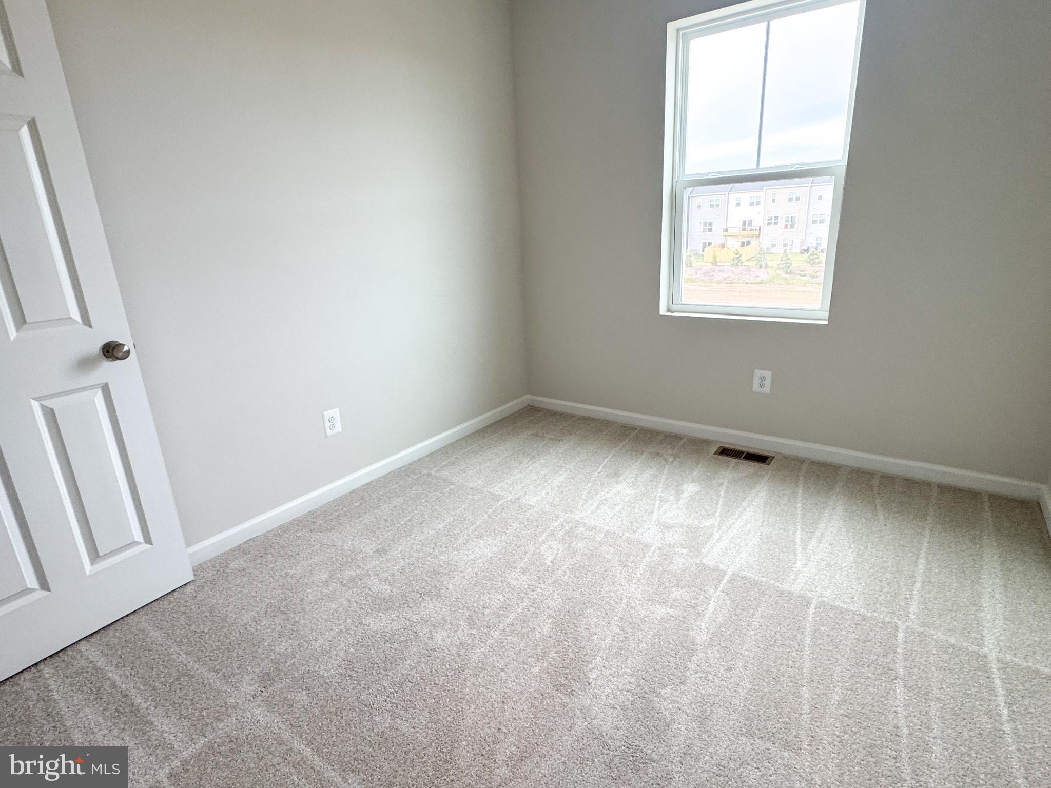 116 Flaxen Mane Court Stephenson, VA 22656 - Photo 16 of 28 an empty room with a window