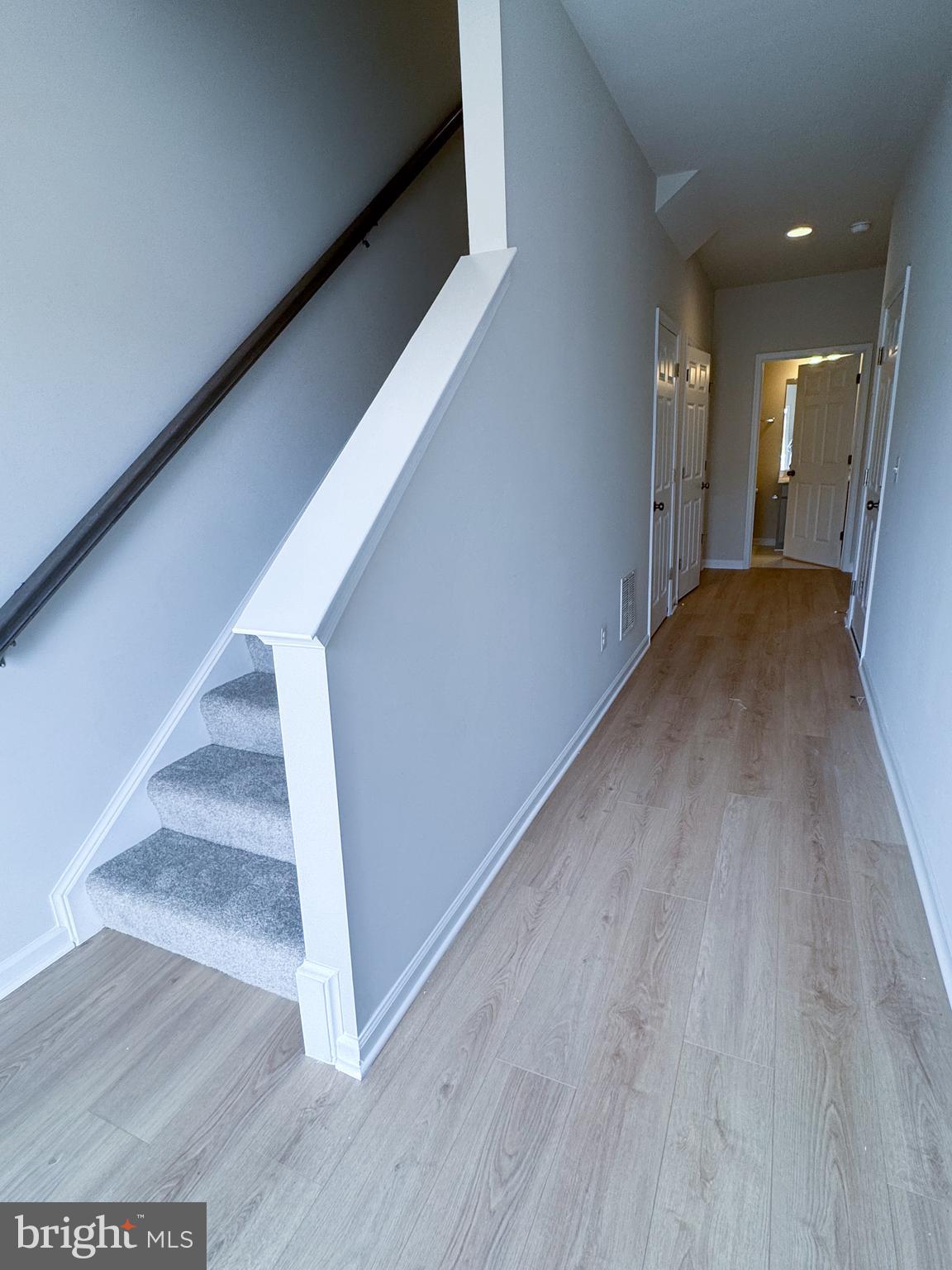 116 Flaxen Mane Court Stephenson, VA 22656 - Photo 2 of 28 a view of a hallway with wooden floor