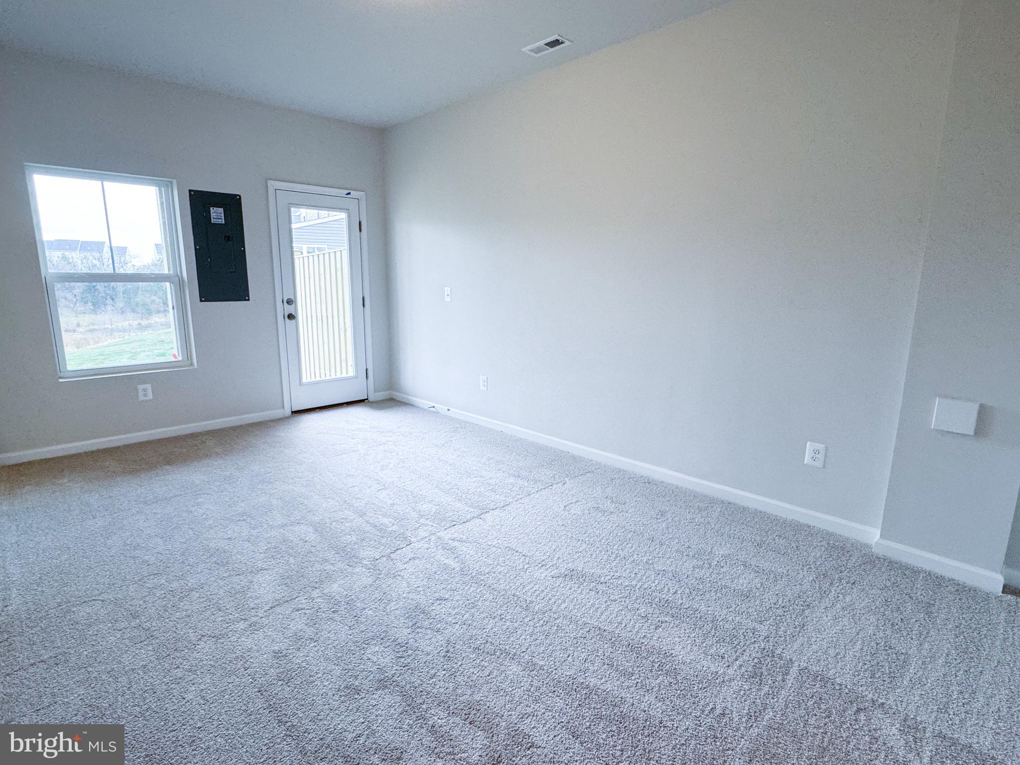 116 Flaxen Mane Court Stephenson, VA 22656 - Photo 3 of 28 an empty room with windows