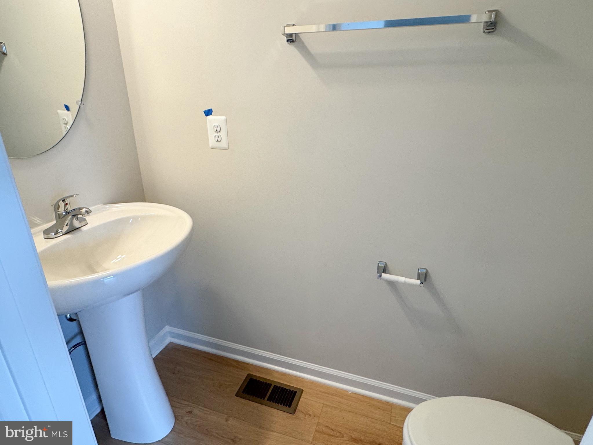 116 Flaxen Mane Court Stephenson, VA 22656 - Photo 10 of 28 a bathroom with a sink mirror and toilet