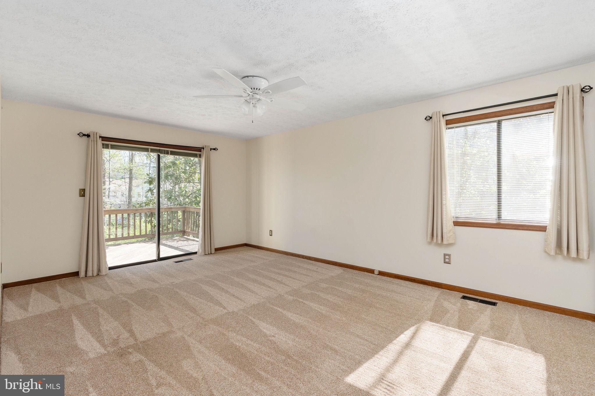 100 Pleasant Grove Road Locust Grove, VA 22508 - Photo 18 of 32 a view of an empty room with a window