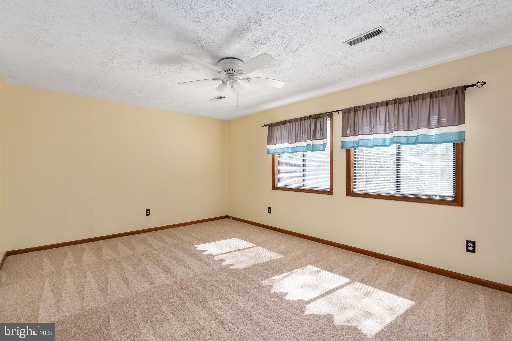 100 Pleasant Grove Road Locust Grove, VA 22508 - Photo 23 of 32 a view of an empty room with a window