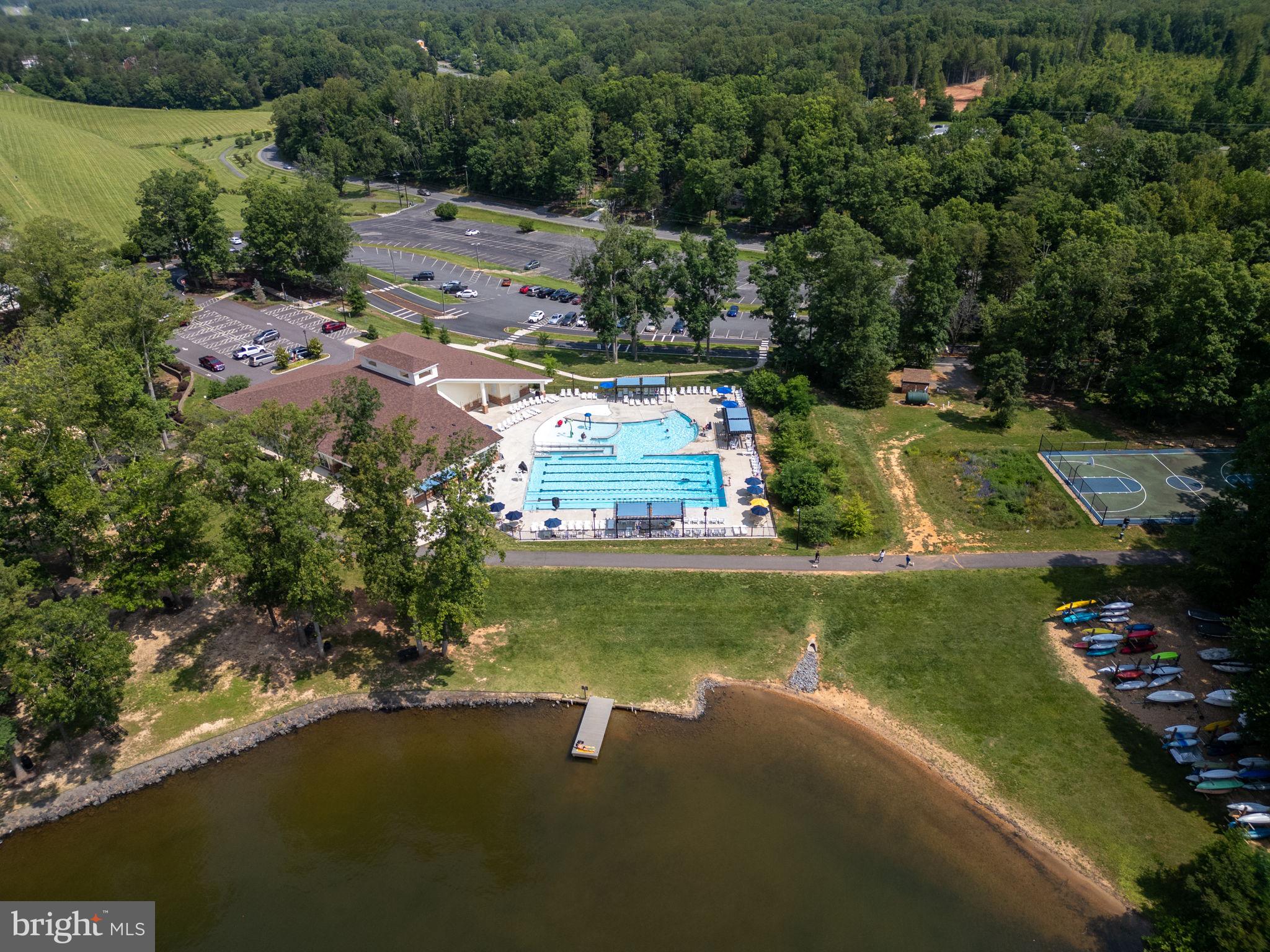 100 Pleasant Grove Road Locust Grove, VA 22508 - Photo 29 of 32 an aerial view of a house with a yard basket ball court and outdoor seating