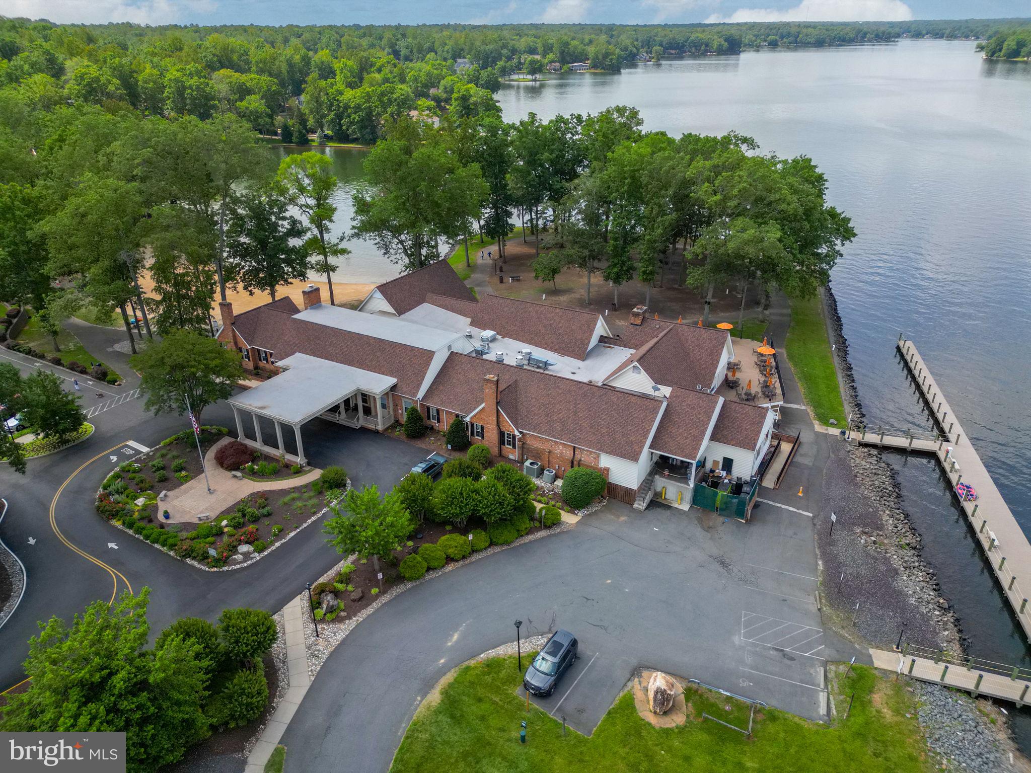 100 Pleasant Grove Road Locust Grove, VA 22508 - Photo 30 of 32 an aerial view of a house with a garden and lake view