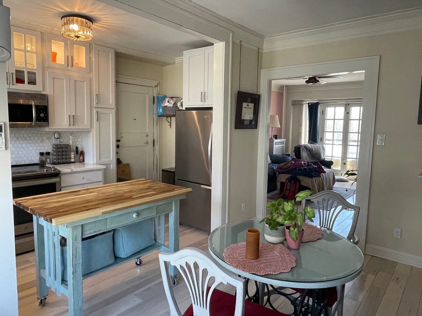 408 North Prairie Street, Unit 8 Champaign, IL 61820 - Photo 12 of 19 a kitchen with a table and chairs in it