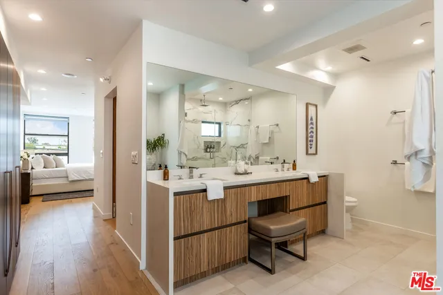 a view of a kitchen cabinets and dining room