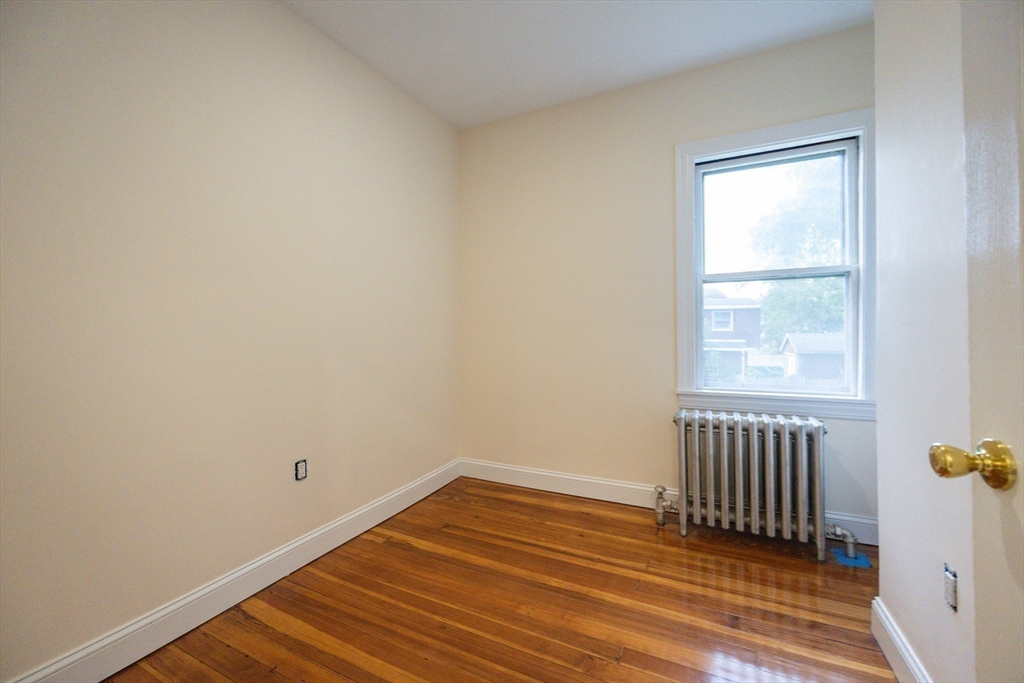 12 Lothrop Street Saugus, MA 01906 - Photo 24 of 42 a view of an empty room with a window