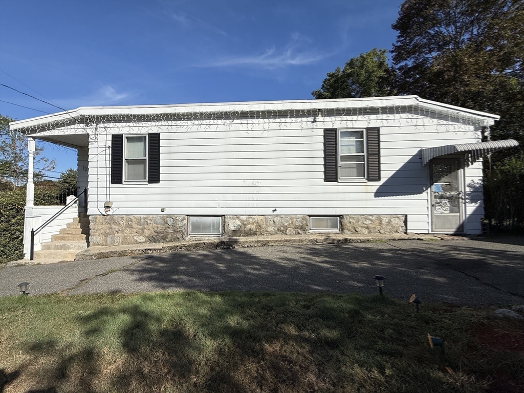 12 Lothrop Street Saugus, MA 01906 - Photo 25 of 42 a view of a house with a yard