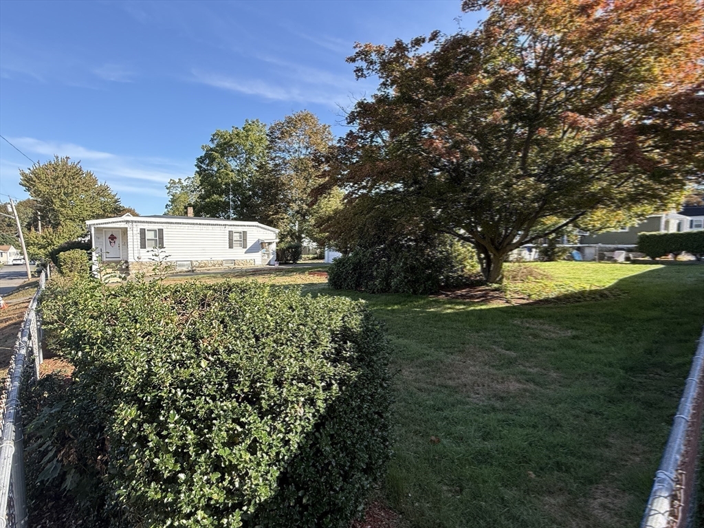 12 Lothrop Street Saugus, MA 01906 - Photo 29 of 42 a view of a house with a yard