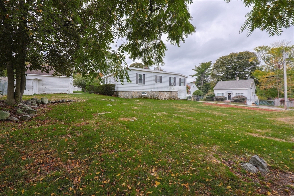 12 Lothrop Street Saugus, MA 01906 - Photo 35 of 42 a view of a house with a big yard