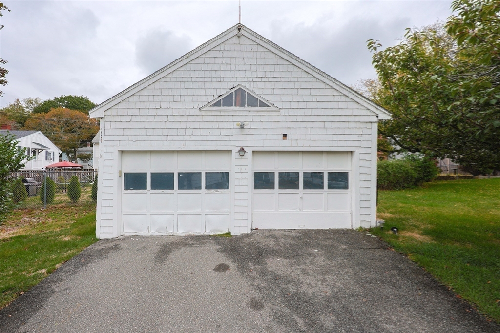 12 Lothrop Street Saugus, MA 01906 - Photo 36 of 42 a view of a house with a yard