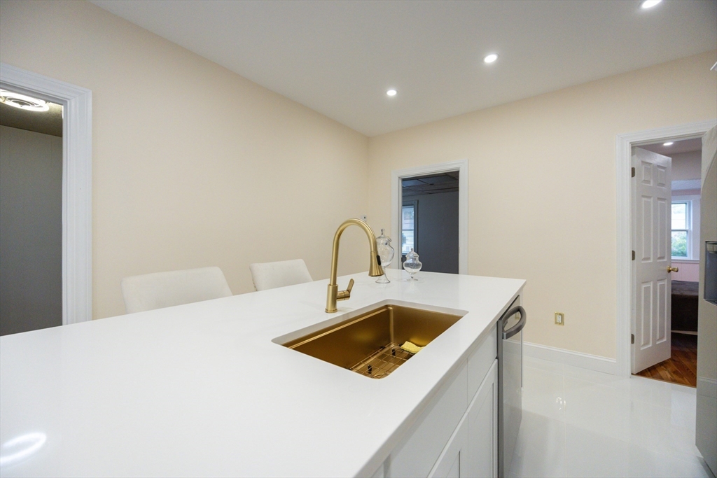 12 Lothrop Street Saugus, MA 01906 - Photo 9 of 42 a view of kitchen with a sink and dishwasher