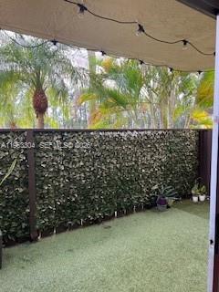 13720 Southwest 90th Avenue, Unit 8 Miami, FL 33176 - Photo 12 of 13 a view of a yard