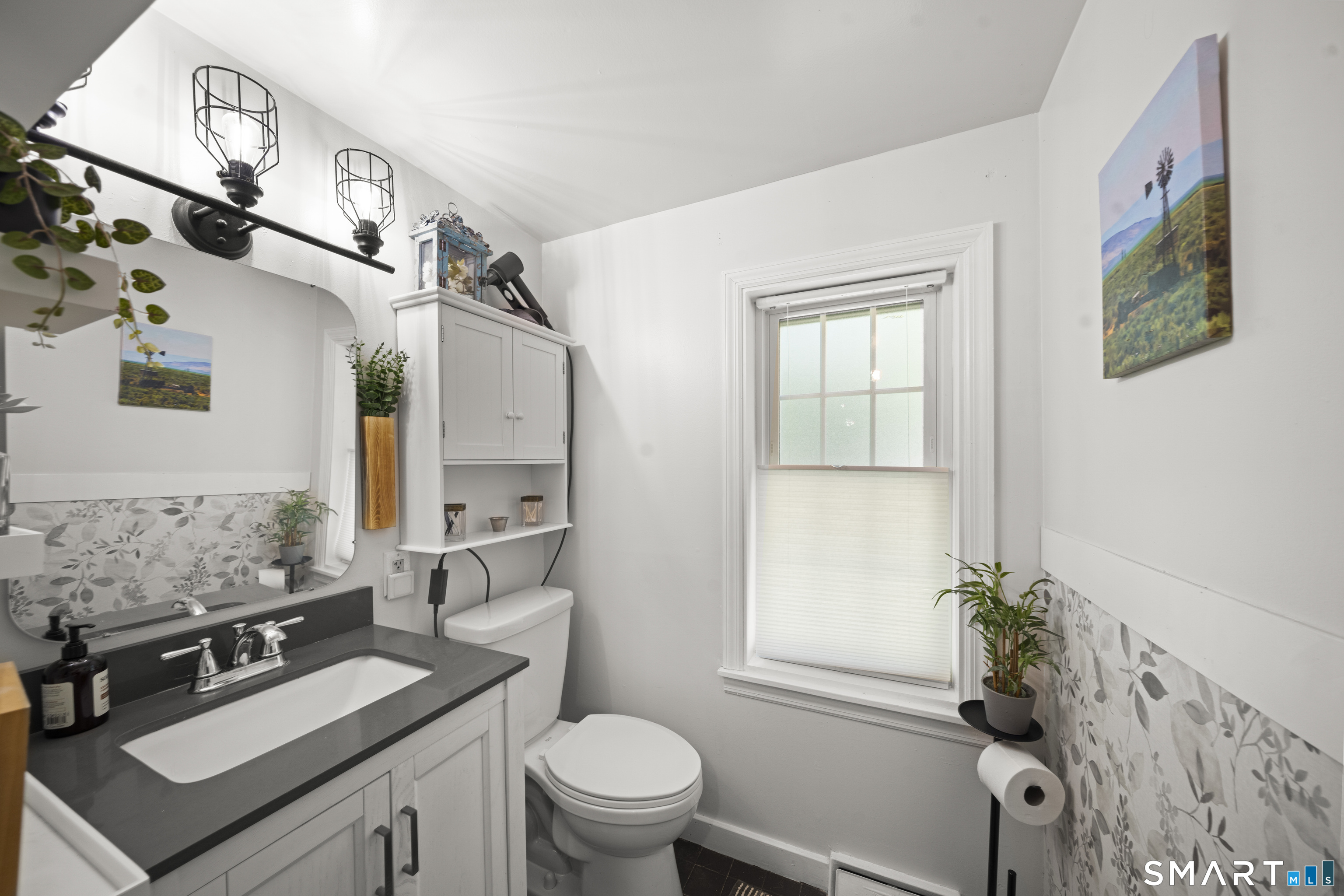 211 Whisconier Road Brookfield, CT 06804 - Photo 15 of 38 a bathroom with a granite countertop toilet sink and mirror