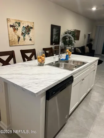 a kitchen with a stove and a cabinet