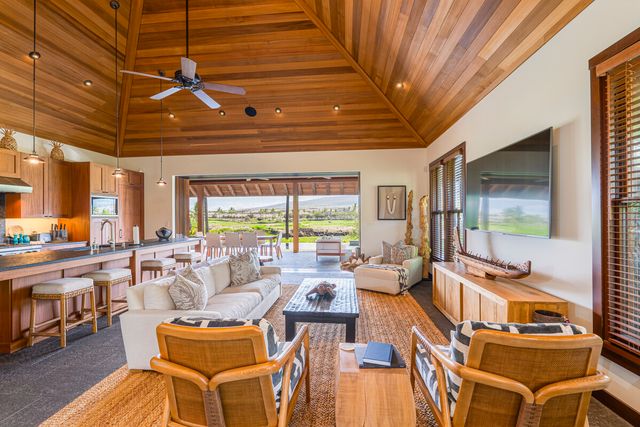 a very nice looking living room with a large window