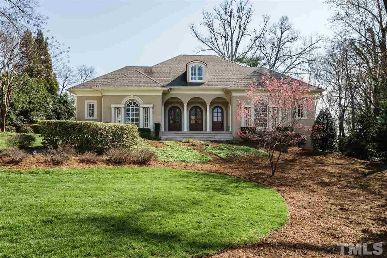 2114 Buckingham Road Raleigh, NC 27607 - Photo 1 of 25 a front view of a house with a yard