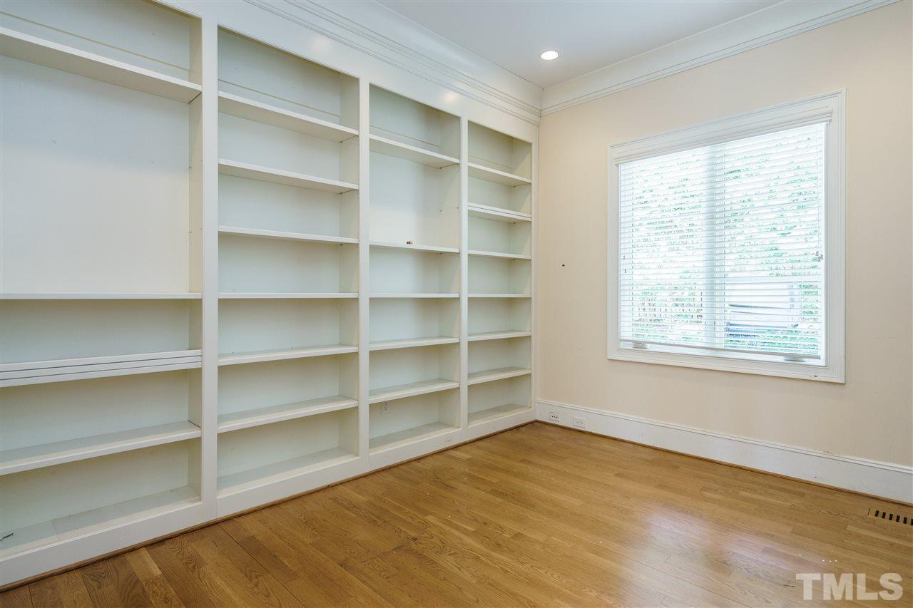2114 Buckingham Road Raleigh, NC 27607 - Photo 14 of 25 a view of an empty room with a window and closet