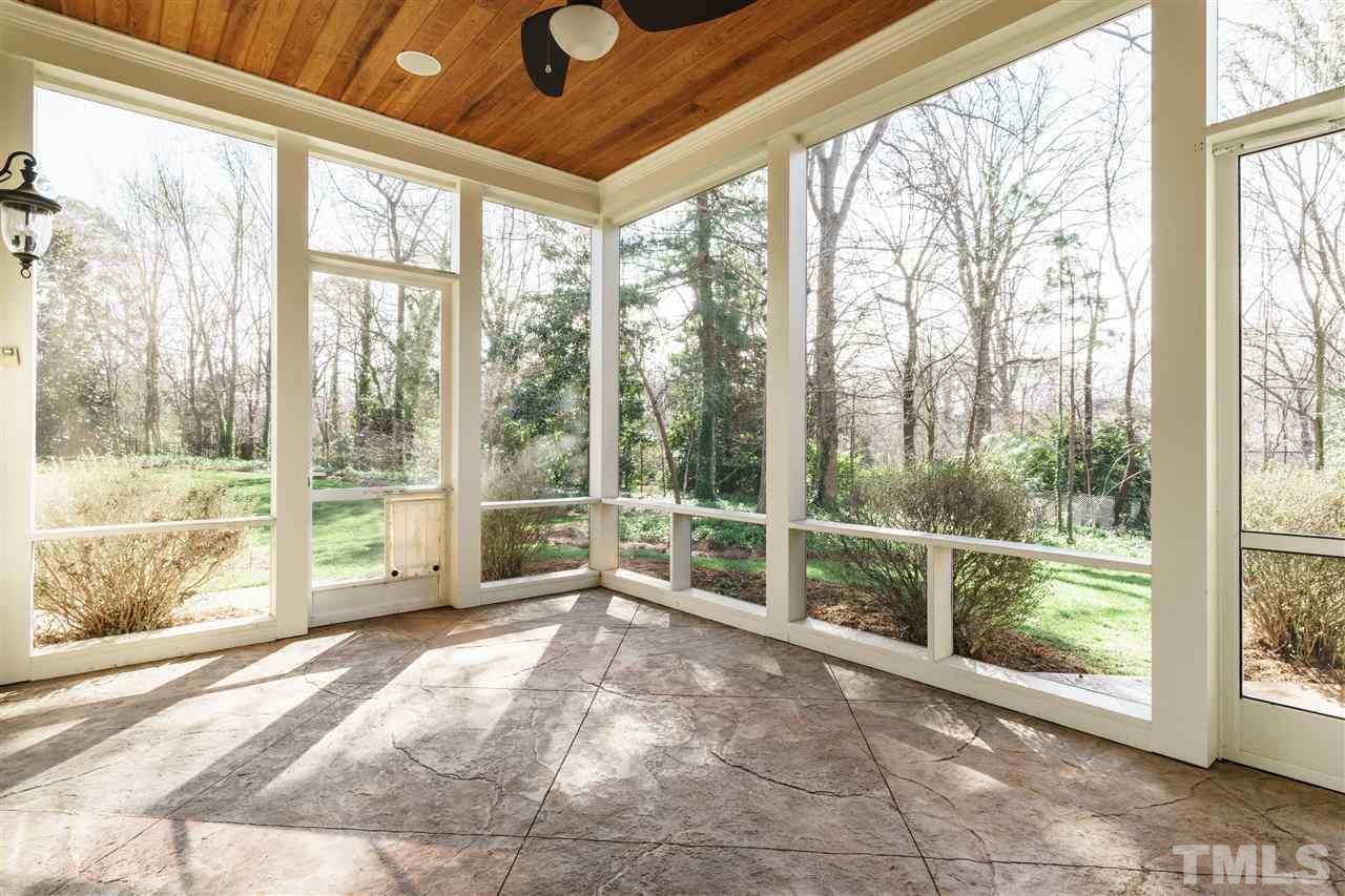 2114 Buckingham Road Raleigh, NC 27607 - Photo 21 of 25 a view of a room with large windows and city view