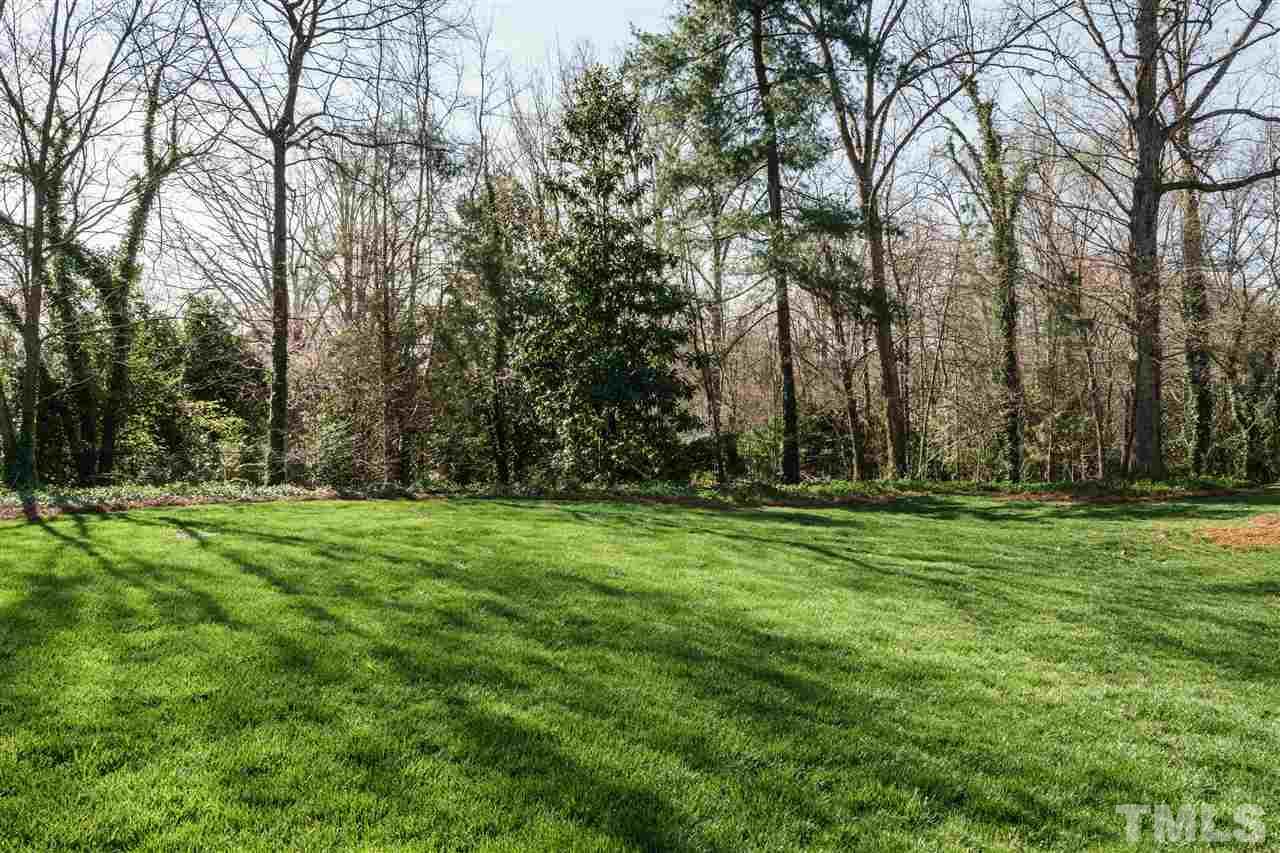2114 Buckingham Road Raleigh, NC 27607 - Photo 22 of 25 a view of outdoor space with trees all around