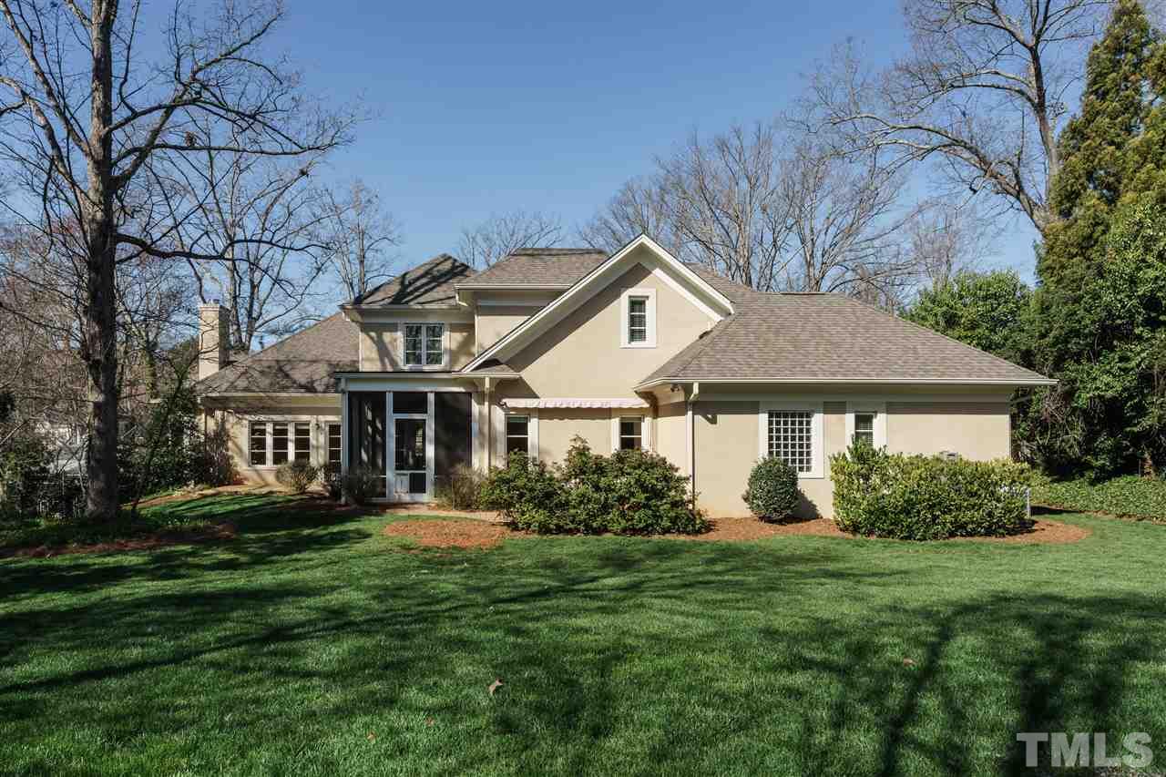 2114 Buckingham Road Raleigh, NC 27607 - Photo 24 of 25 a front view of house with yard and green space