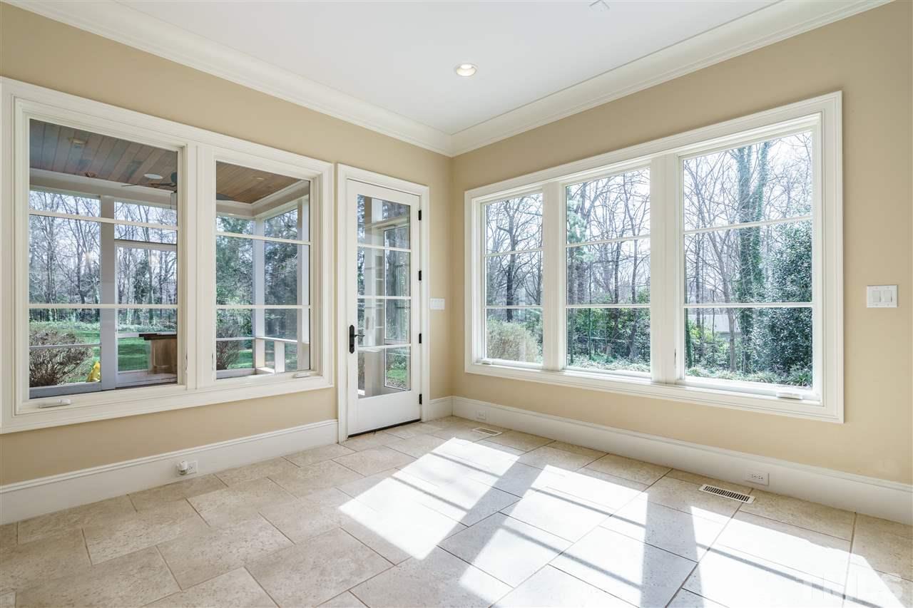 2114 Buckingham Road Raleigh, NC 27607 - Photo 10 of 25 a view of an empty room with a window