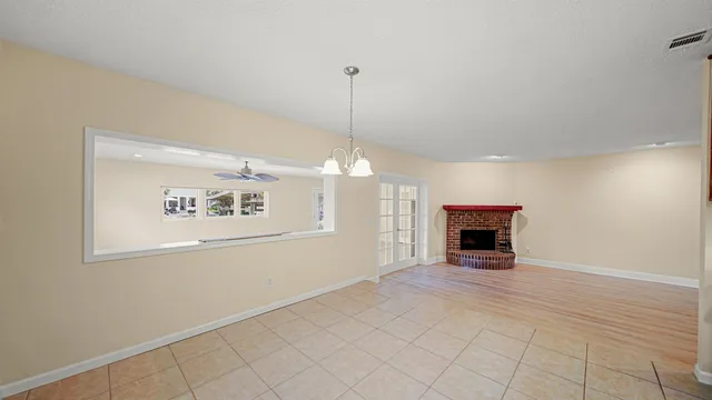 a view of a livingroom and a kitchen