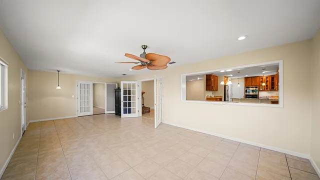 a view of an empty room and window