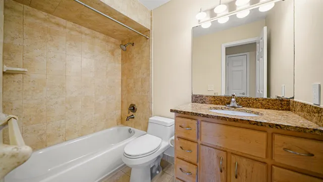 a view of a chandelier fan in a room