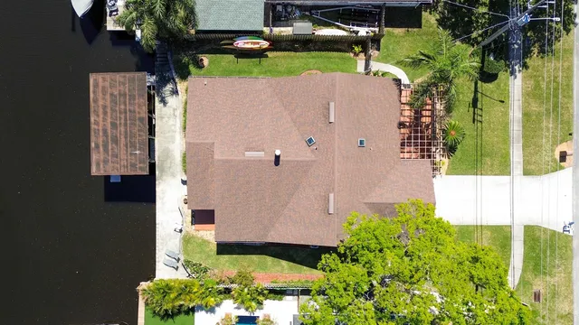 a view of balcony with two chairs and a table