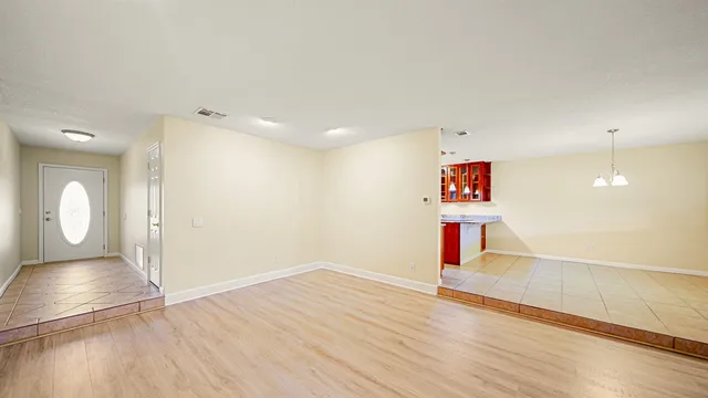 a kitchen with stainless steel appliances granite countertop a sink and a stove
