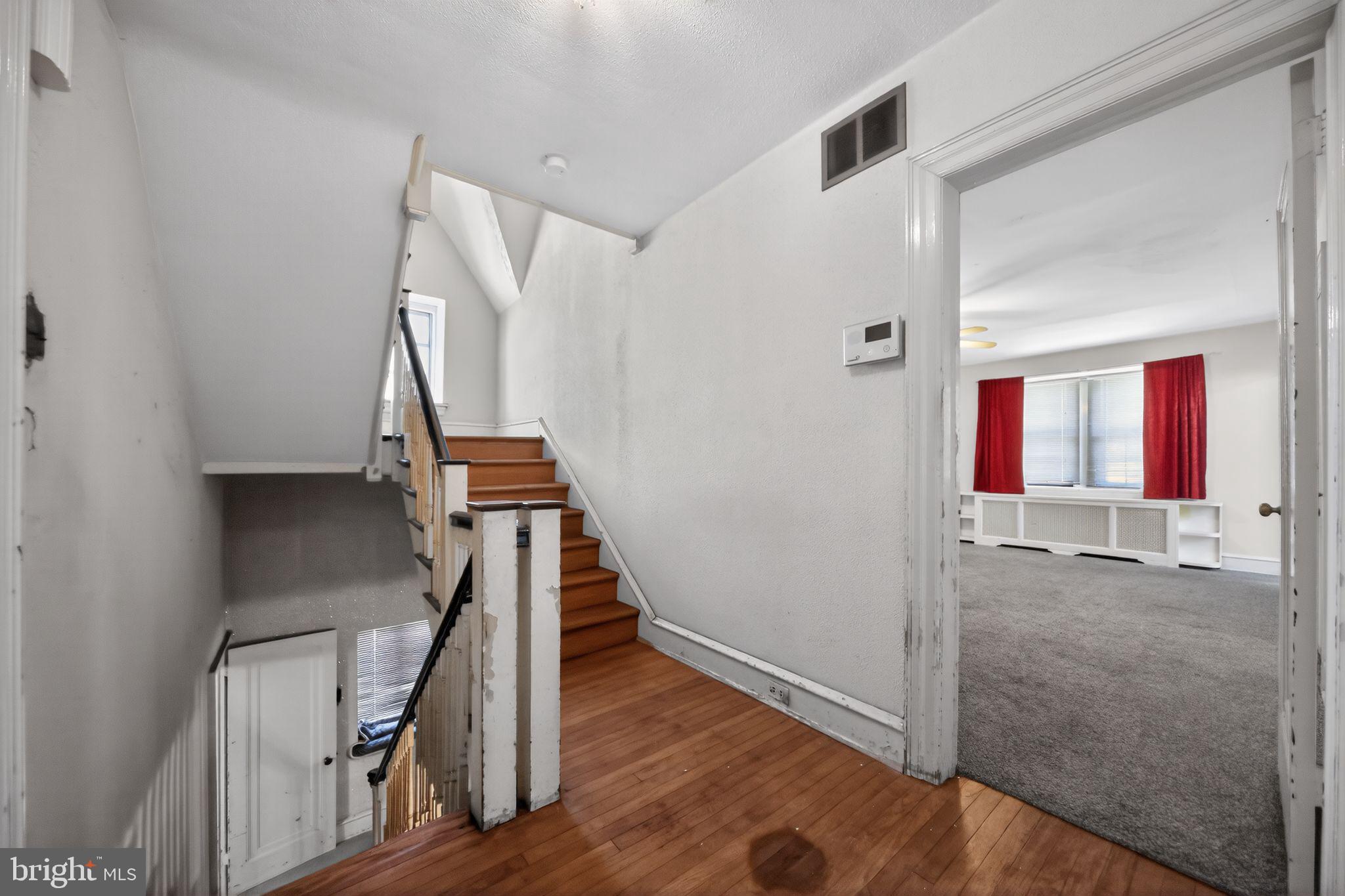 6448 Cherokee Street Philadelphia, PA 19119 - Photo 26 of 33 a view of entryway and hall with wooden floor